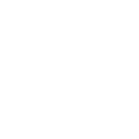 Człowiek za biurkiem z komputerem - symbol usług BHP