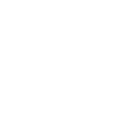 Człowiek pracujący przy wykresach - symbol usług eksperckich